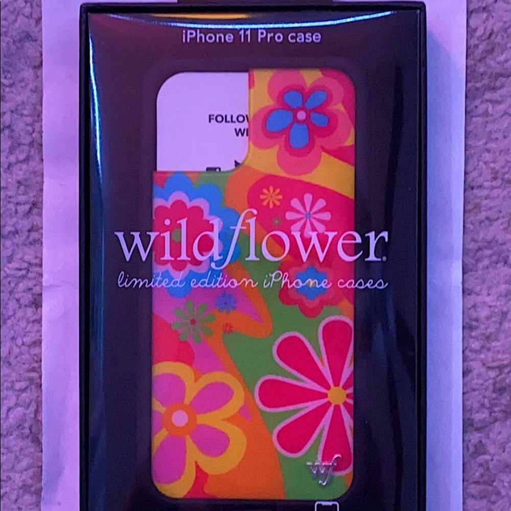 Un opened I phone 11 pro wild flower case